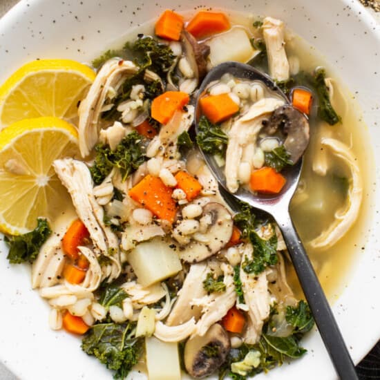 ultimate chicken soup in a bowl with a spoon
