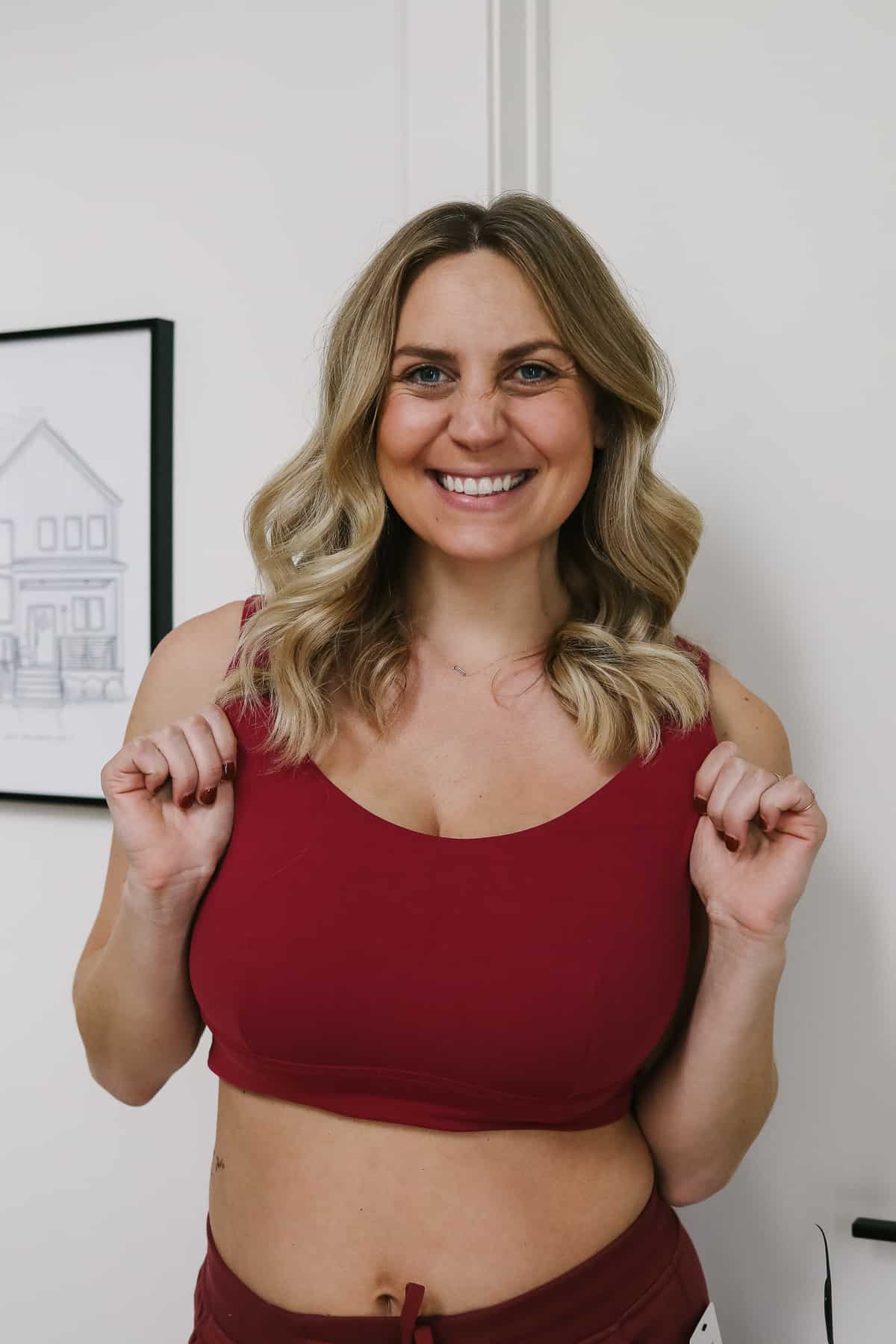 Woman wearing a red sports bra.