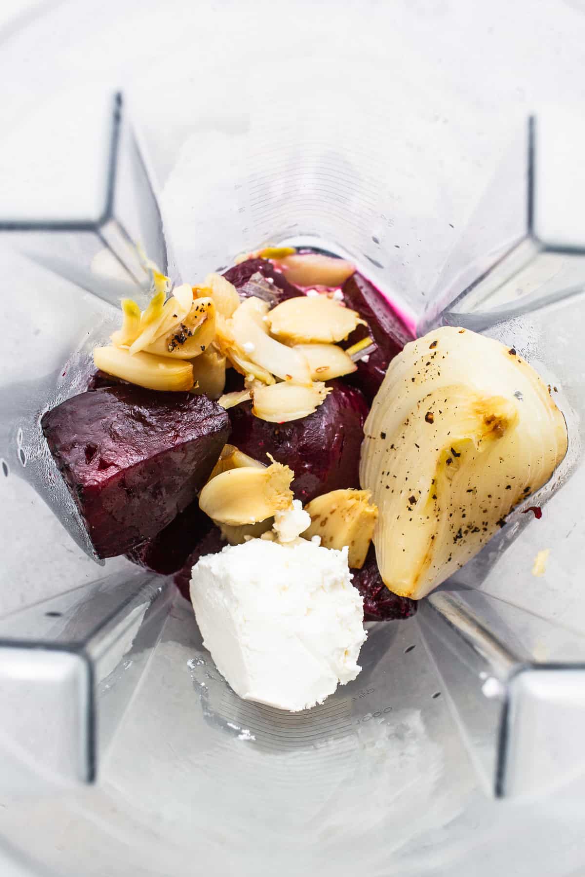 Roasted beets, onion and garlic in a blender.