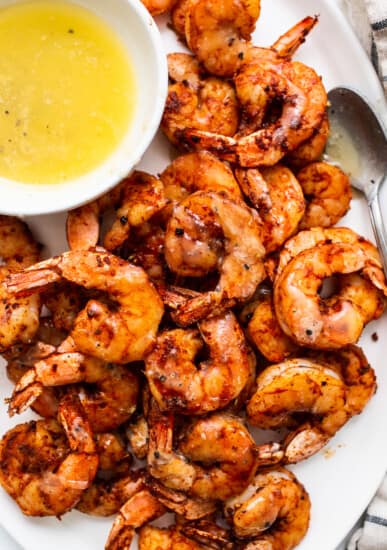 Broiled shrimp on a plate.