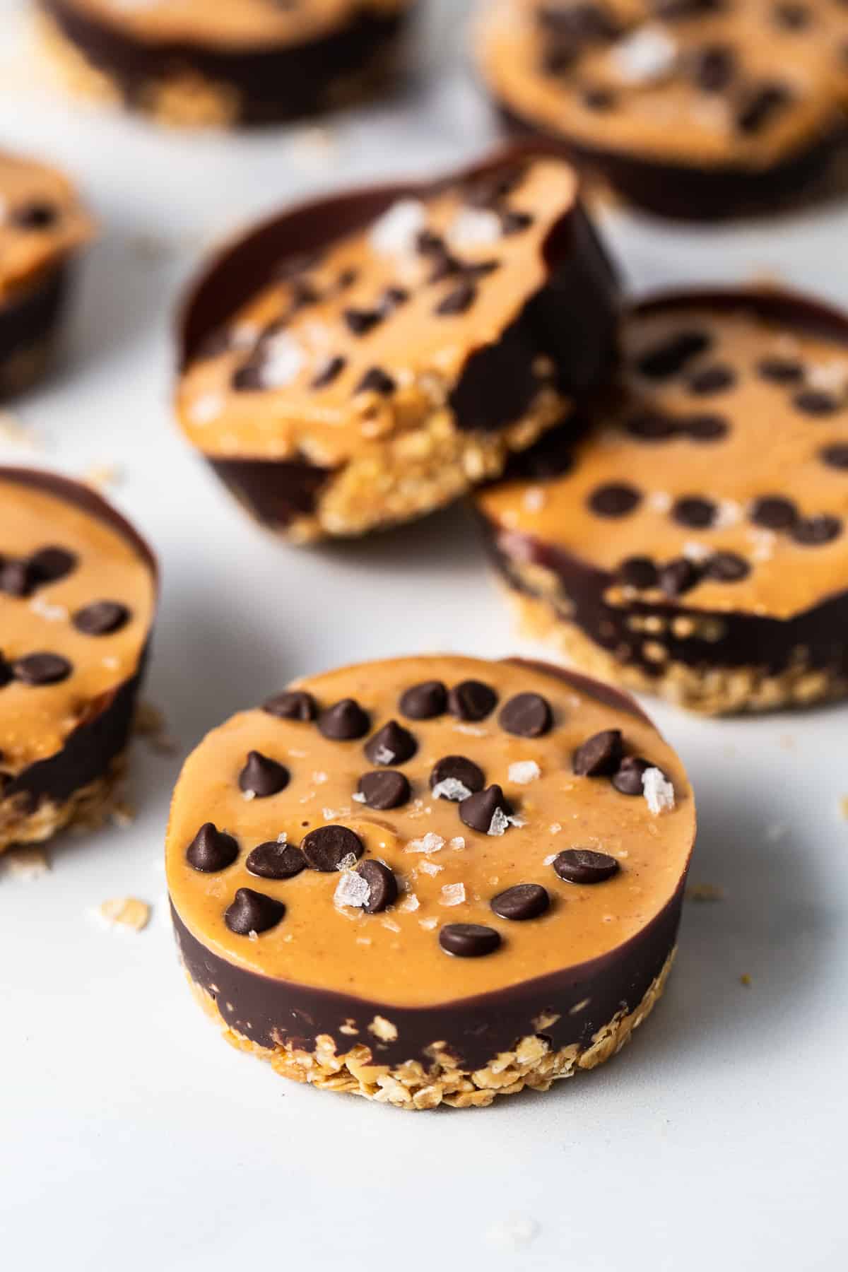 chocolate peanut butter oat cups on counter.