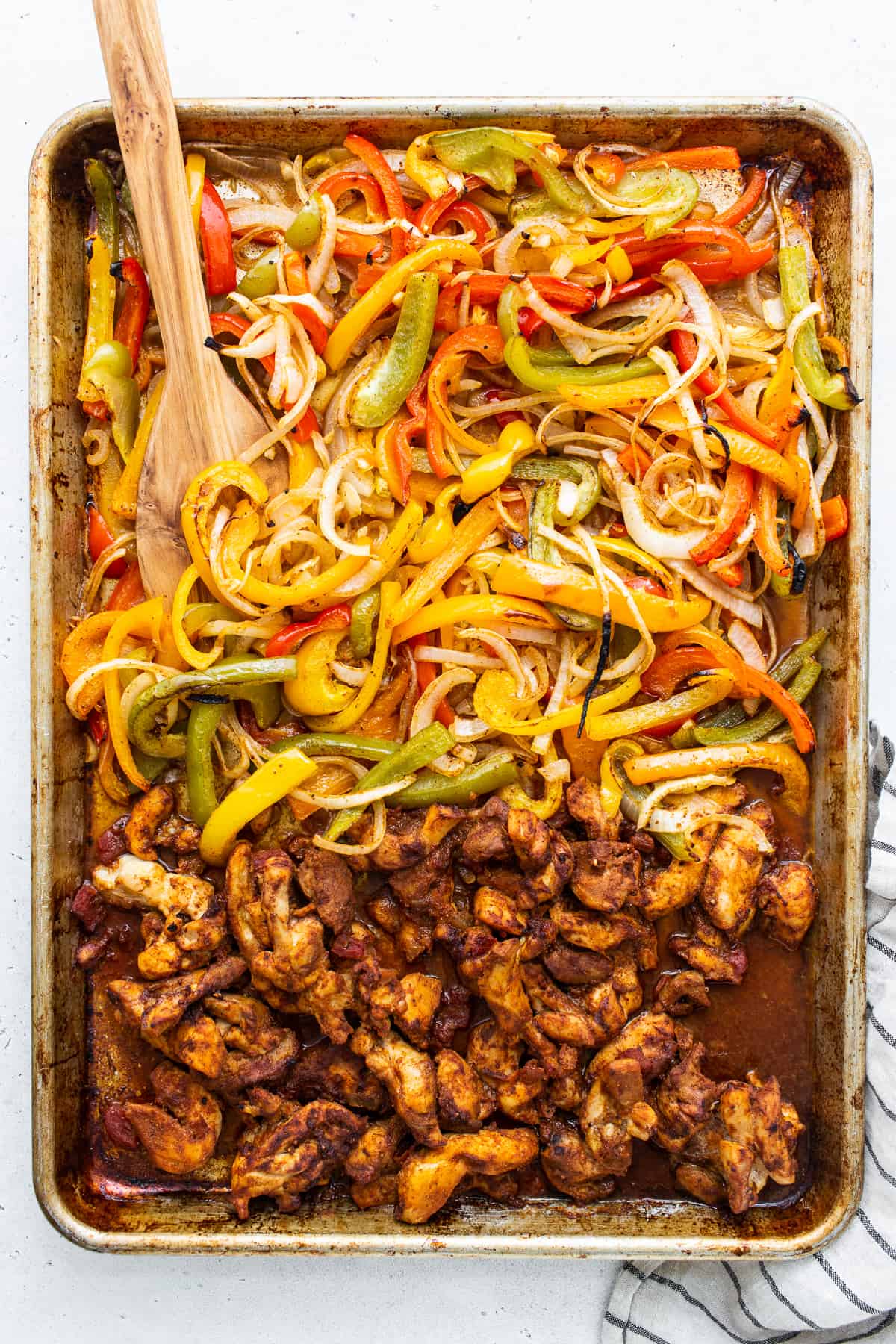 sheet pan chicken fajitas on baking sheet.