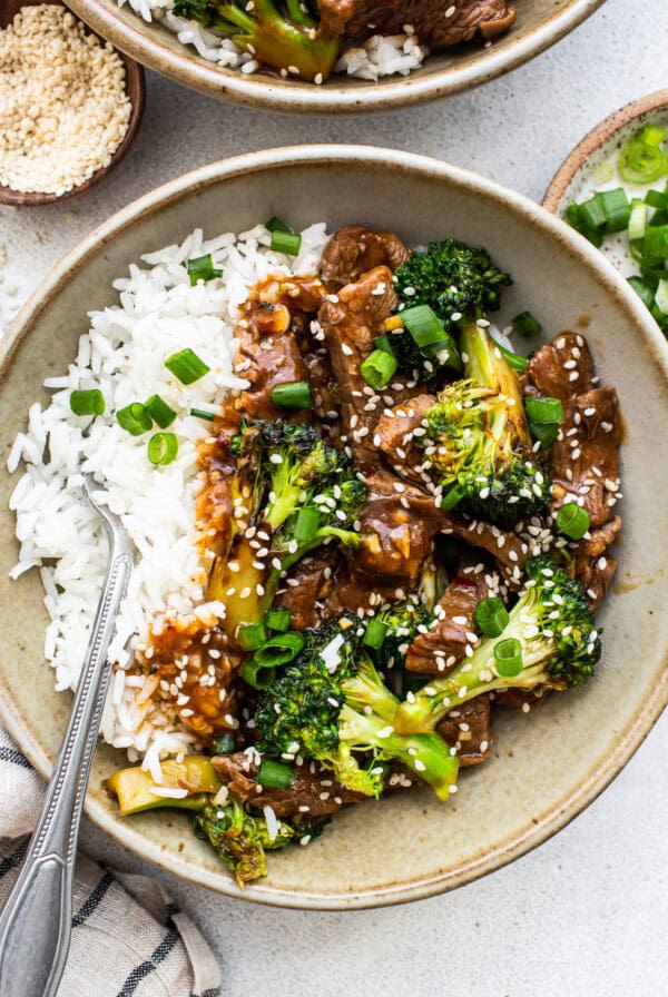 beef and broccoli with sauce in bowl.