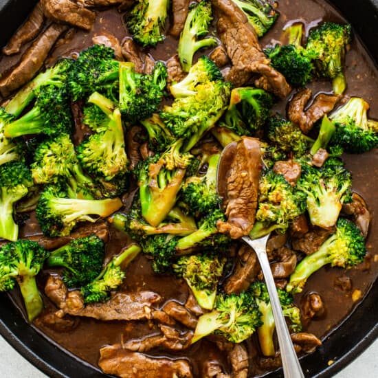 beef and broccoli in pan.