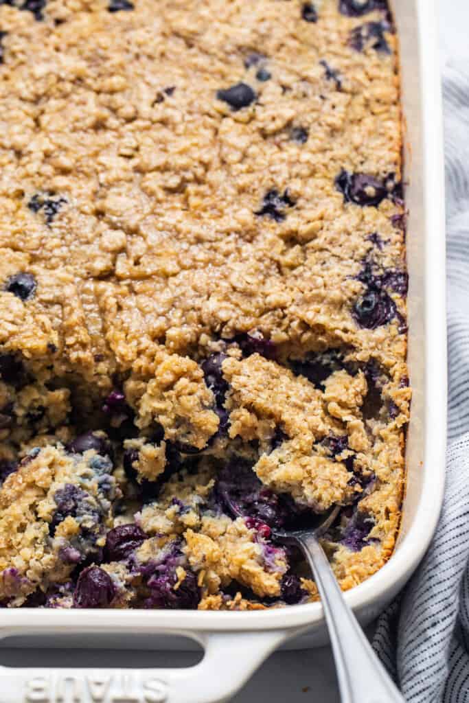 Blueberry muffin baked oatmeal in a casserole dish.