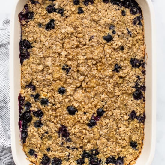Blueberry oatmeal in a white baking dish.