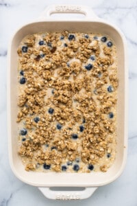 Blueberry oatmeal in a white baking dish.