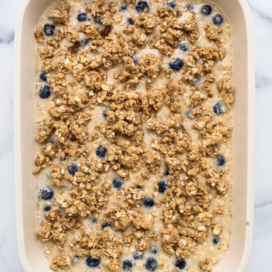 Blueberry oatmeal in a white baking dish.