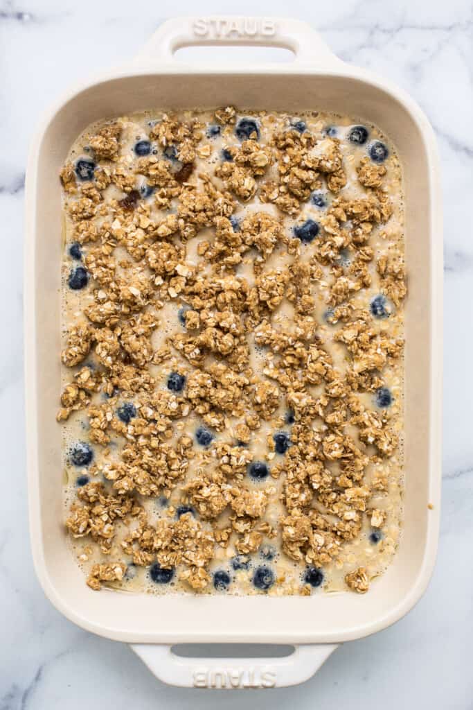 Blueberry muffin baked oatmeal batter with a streusel topping.
