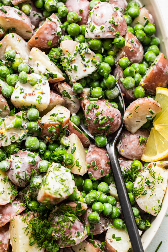 English pea potato salad on a spoon.