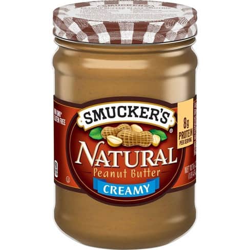 jar of peanut butter on clear background.