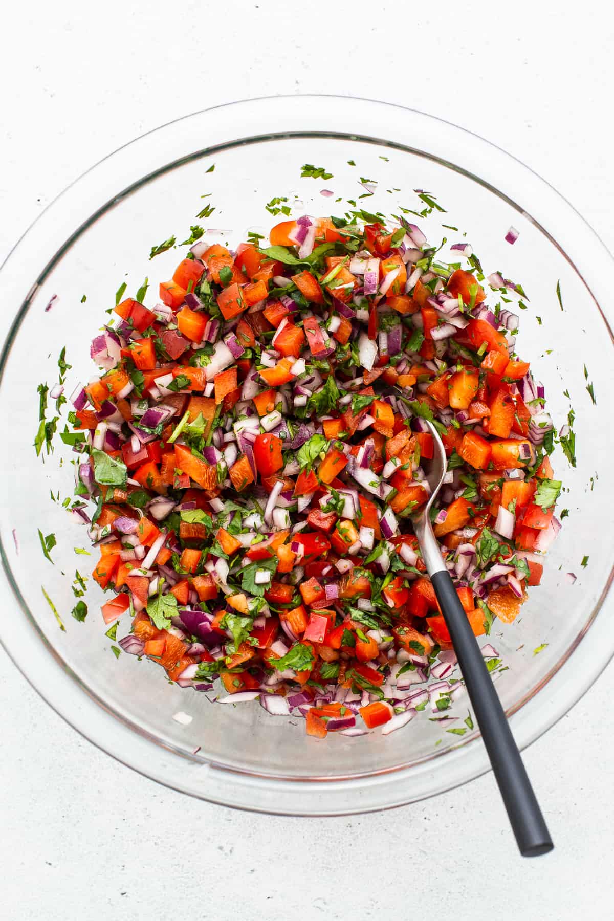 pico de gallo in glass bowl.