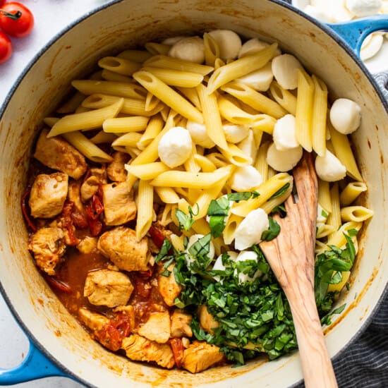 caprese chicken pasta in large pot.