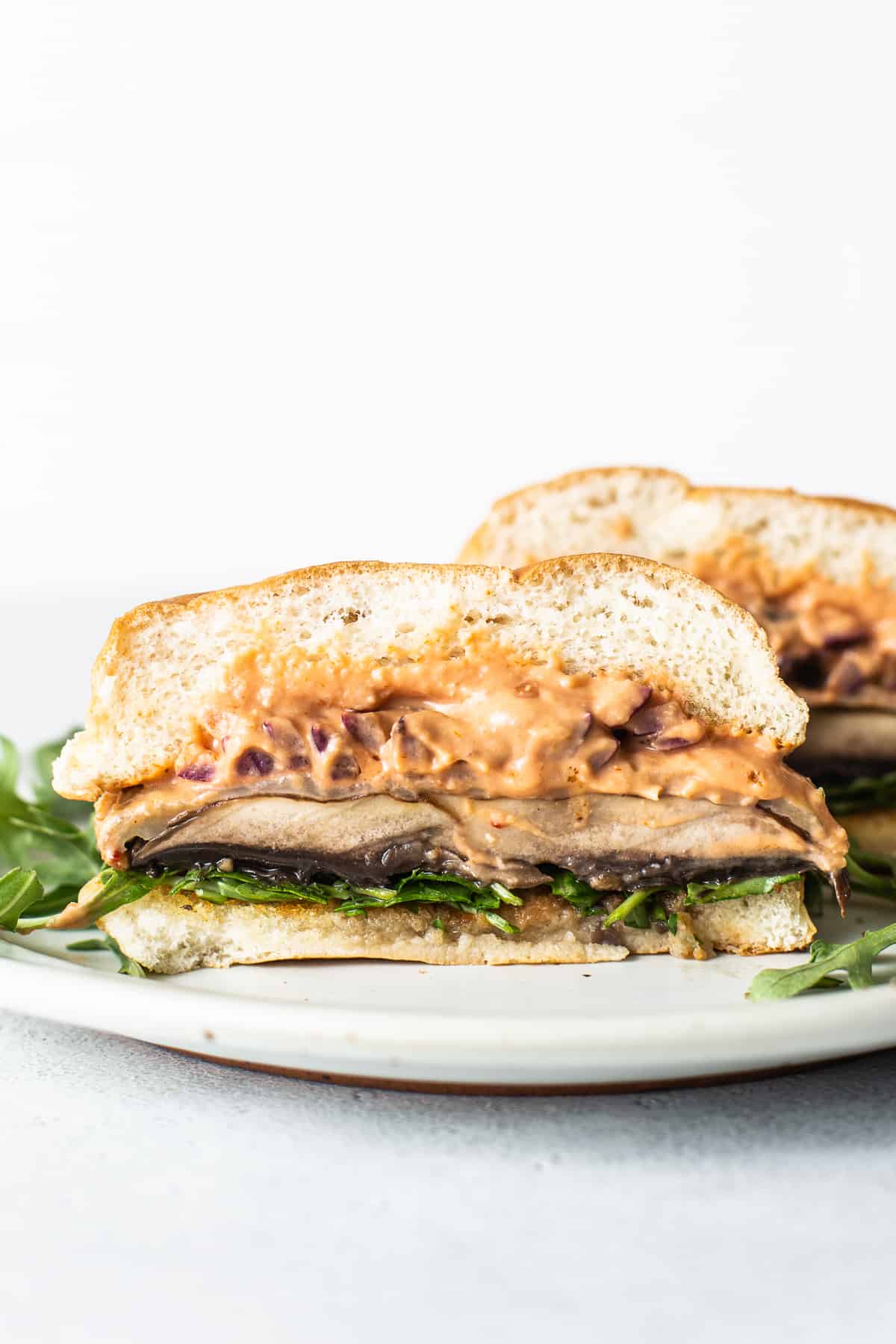 Portobello mushroom burger on a plate.