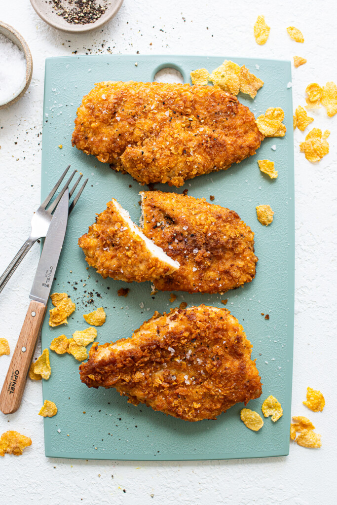 chicken breast on cutting board. 