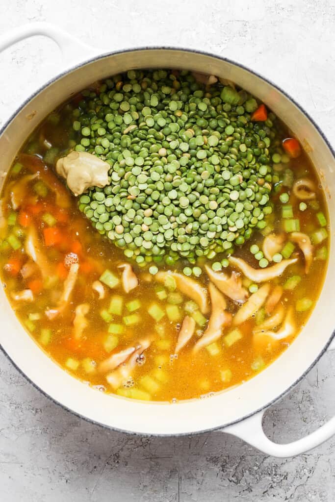 Split peas in a dutch oven with soup broth.