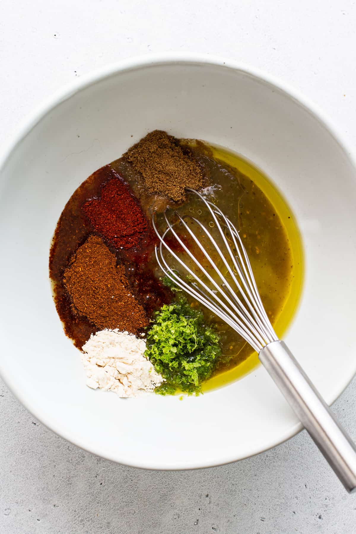 Steak fajita marinade in a bowl.