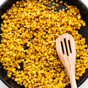 cooking corn in pan.