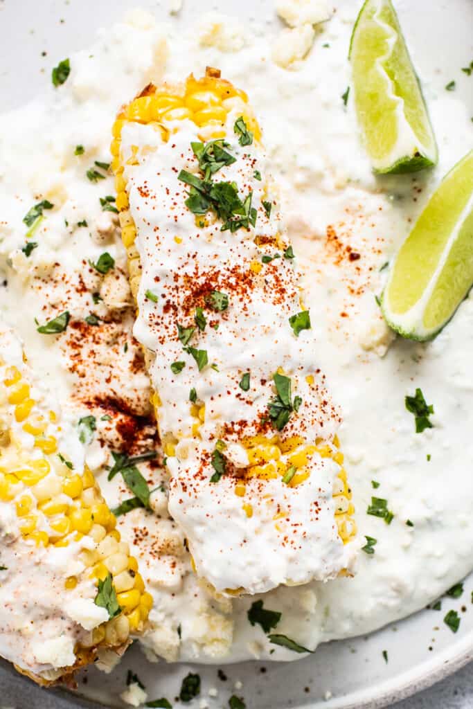 Elote on a plate.