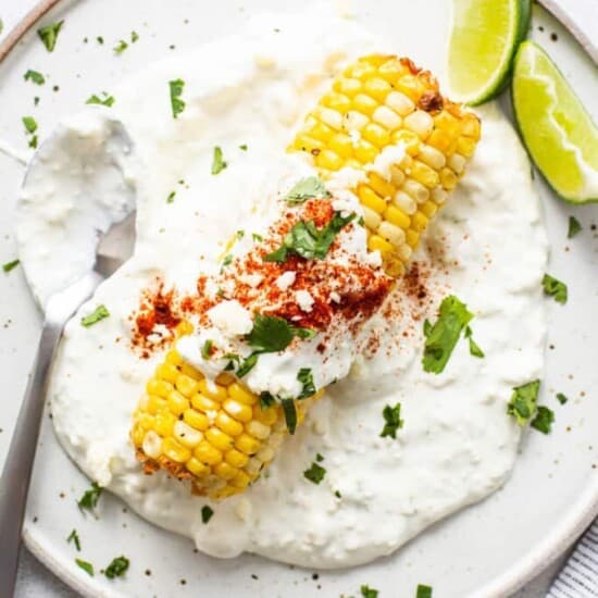 Air fryer elote on a plate.