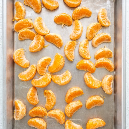 clementines on baking sheet.