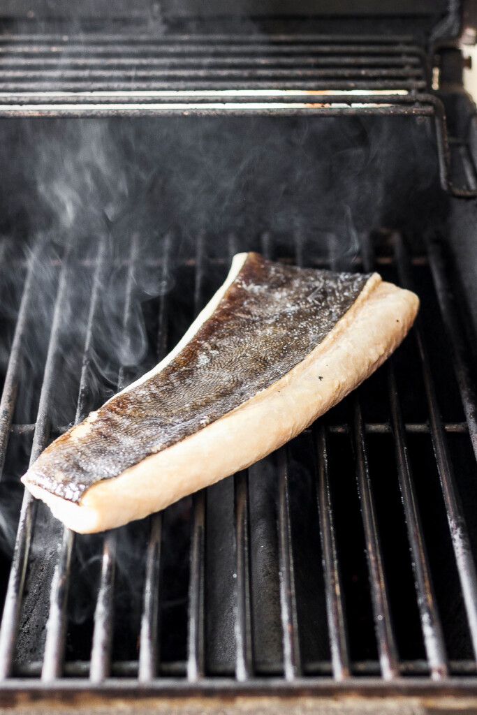 Filet of fish on a grill.