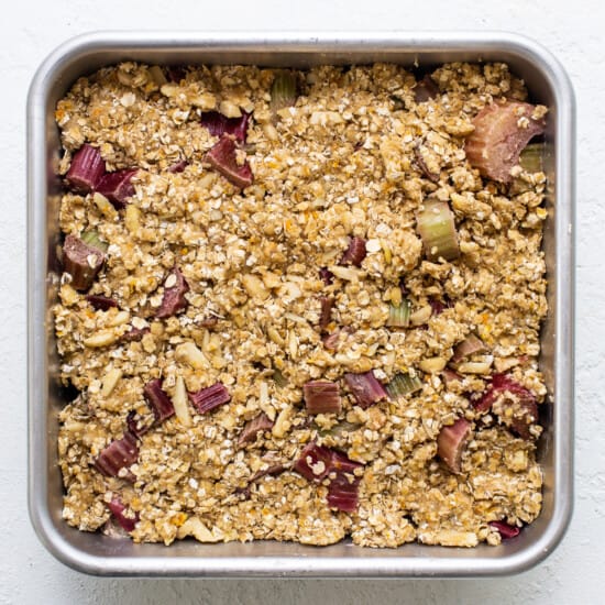 A metal pan with granola in it.