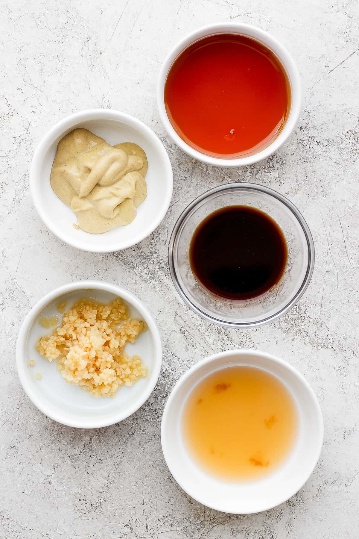 Rib marinade ingredients in bowls.