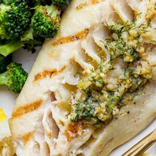a close up of a plate of food with broccoli.
