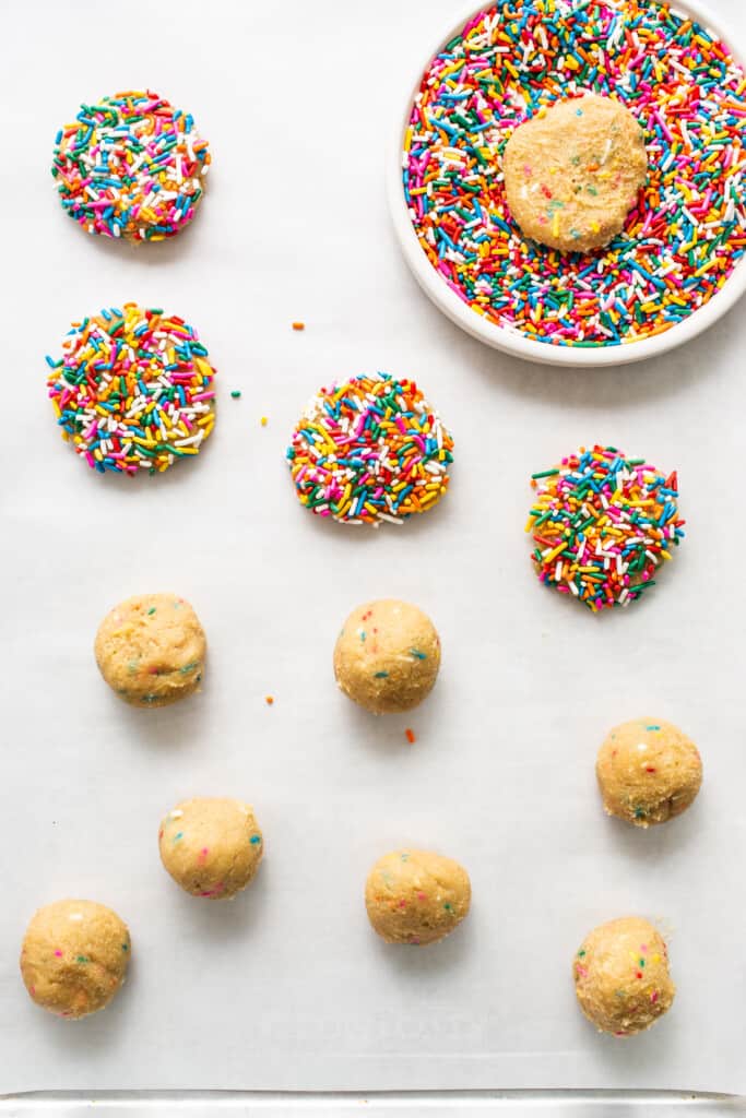 Dip cookies in sprinkles.