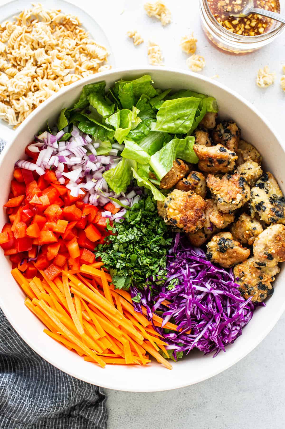 Chicken salad ingredients in a bowl. 