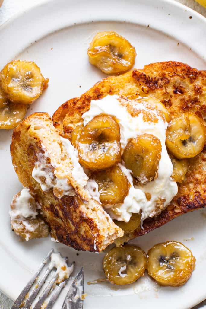 French toast with bananas and whipped cream.