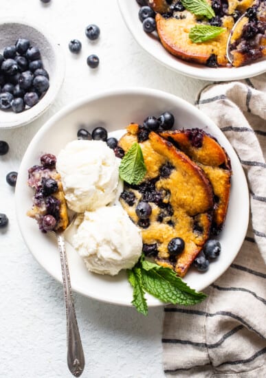cobbler in bowl with ice cream.