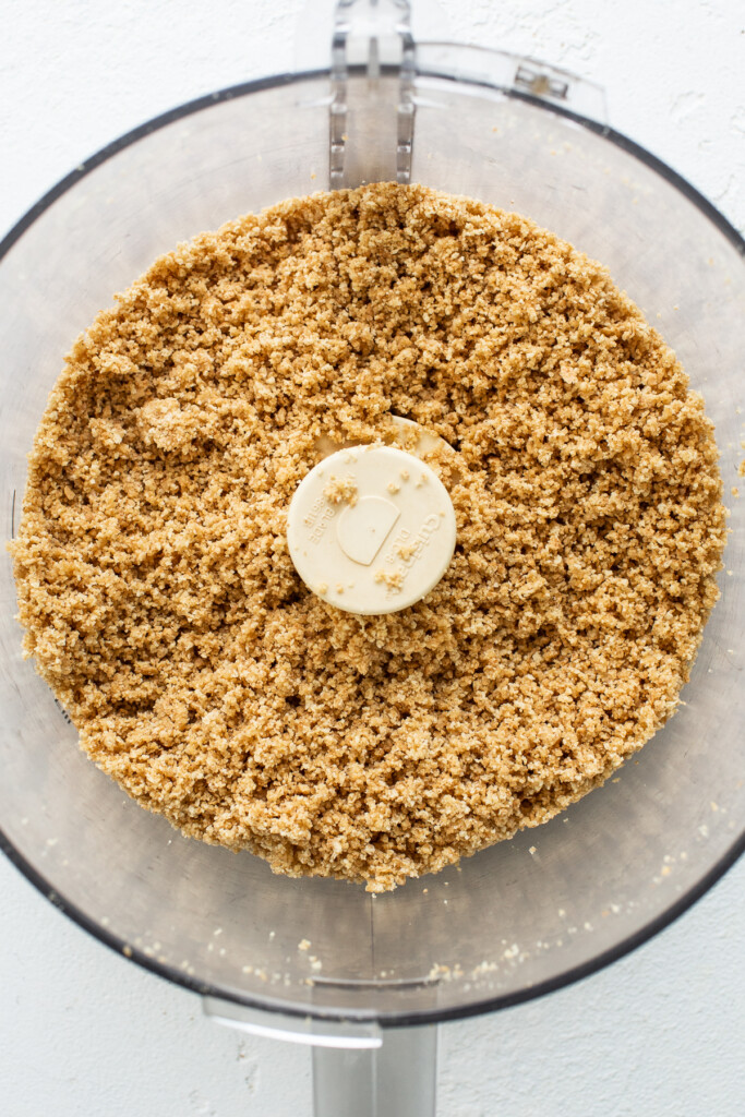 Graham cracker crumbs in a food processor.