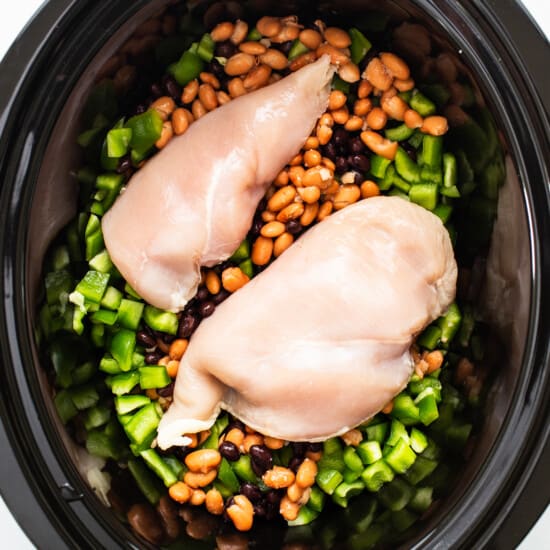 Chicken and beans in a slow cooker.