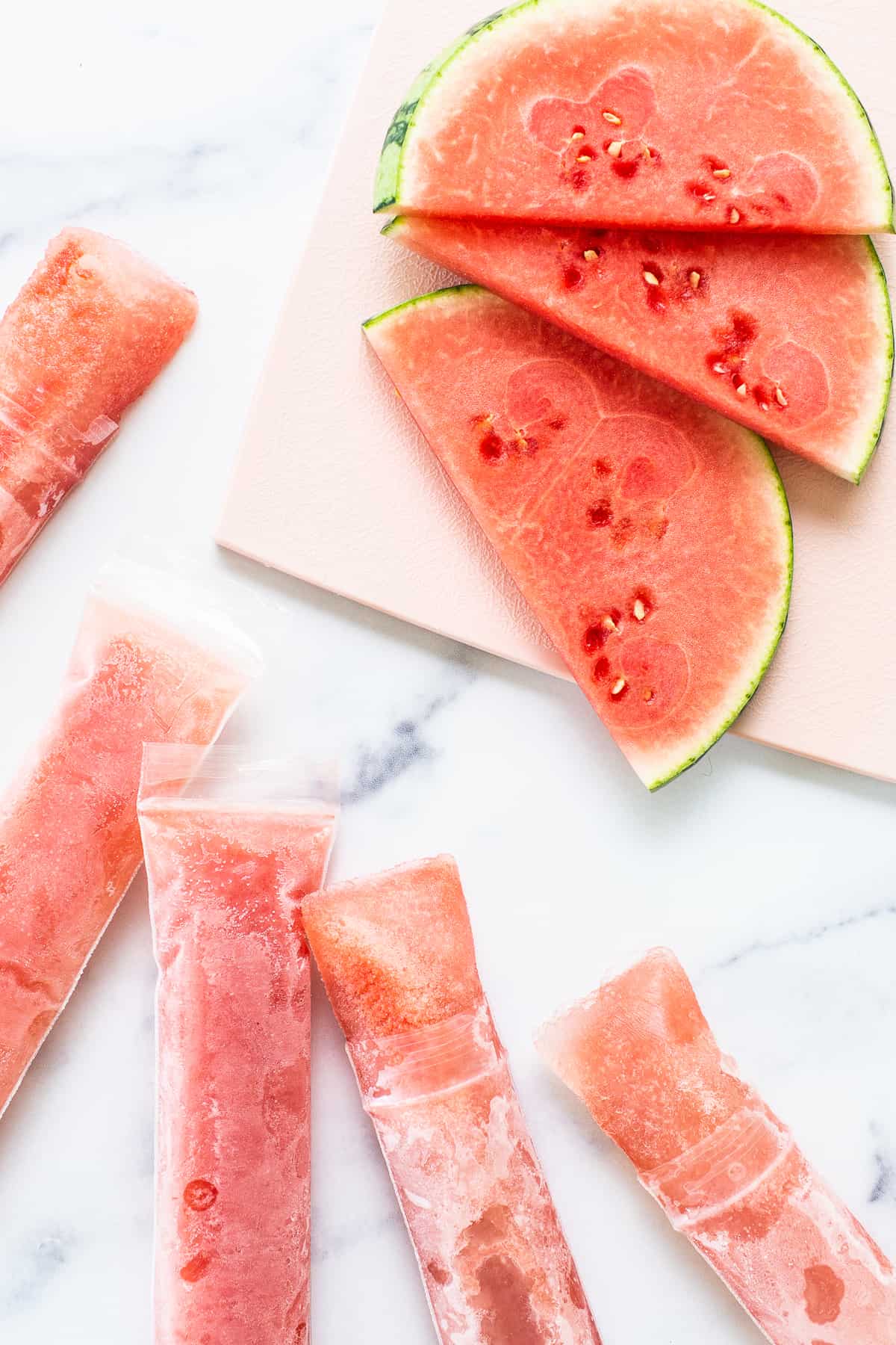 waterlemon freeze pops on table.