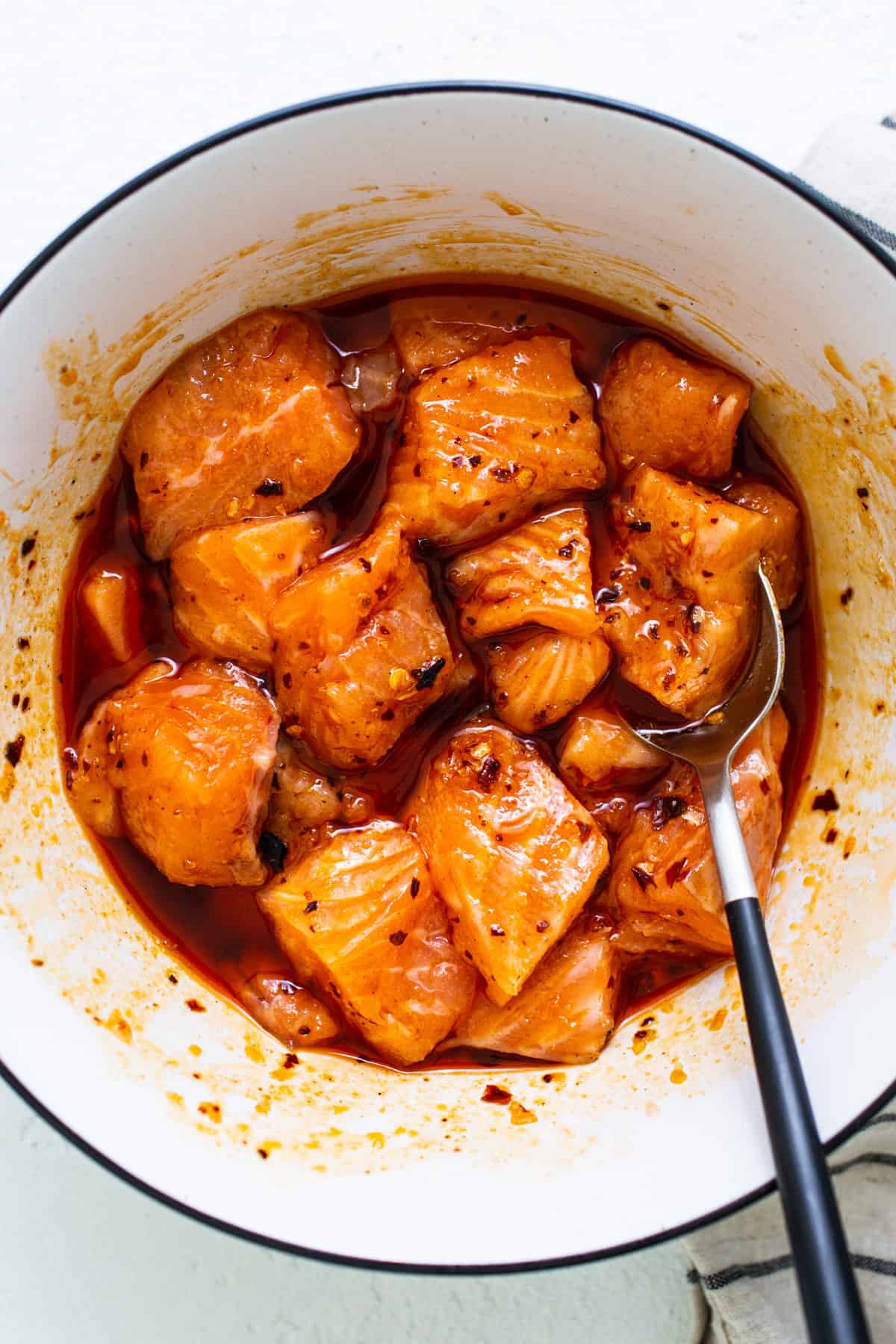 a bowl of food with a spoon in it.