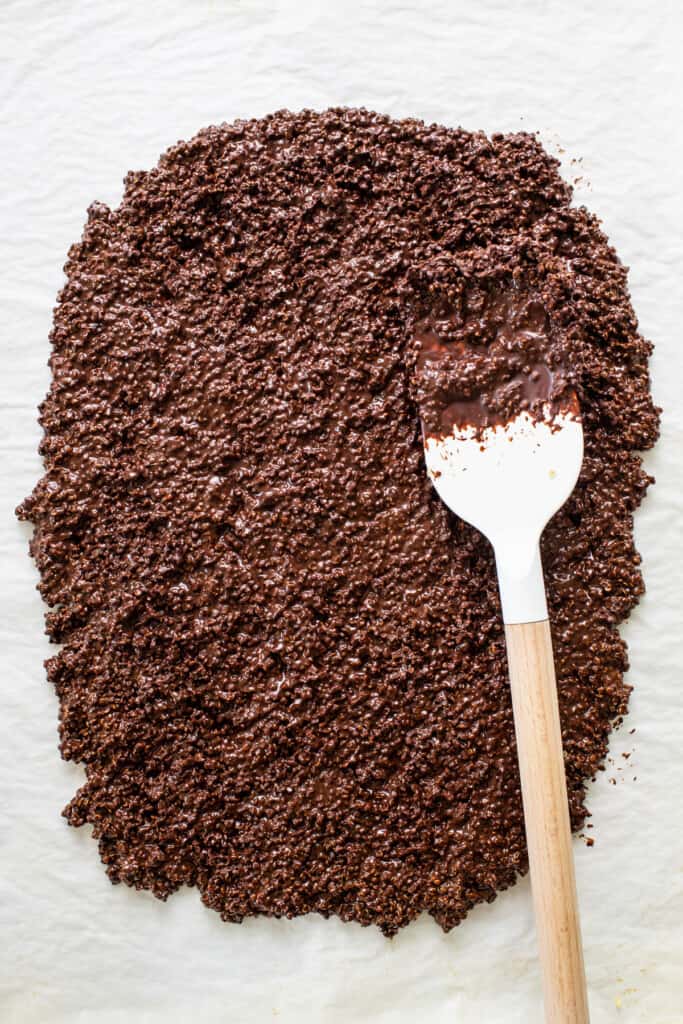 a spoon with some chocolate powder on it.