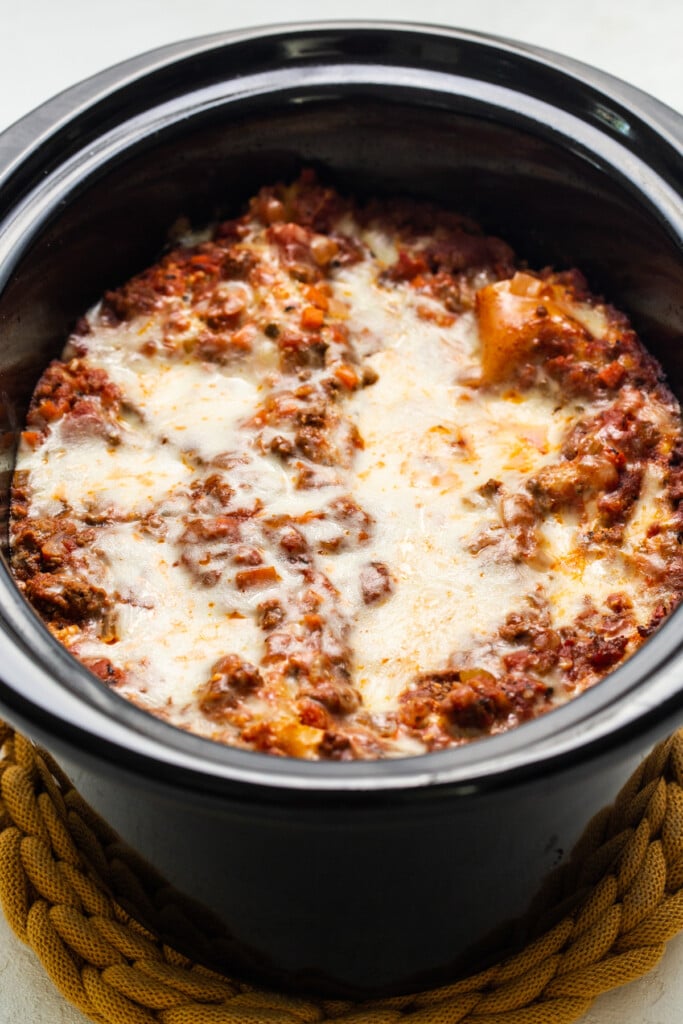 a close up of a pot of food on a table.