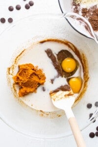 a white plate topped with chocolate and eggs.