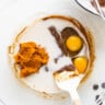 a white plate topped with chocolate and eggs.