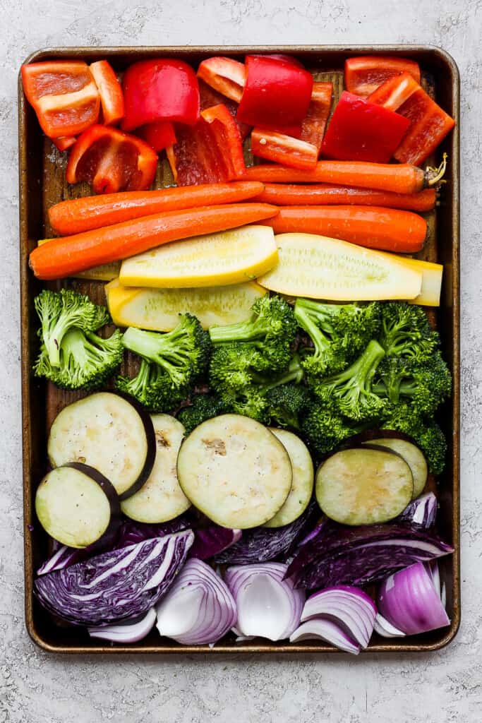 a tray filled with different types of vegetables.