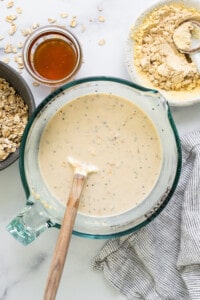 a bowl filled with oatmeal next to a bowl of oatme.