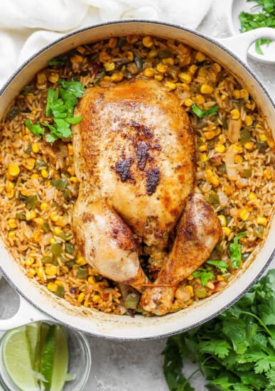 chicken and rice in a skillet.