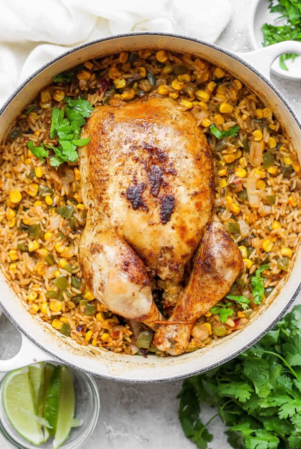 chicken and rice in a skillet.