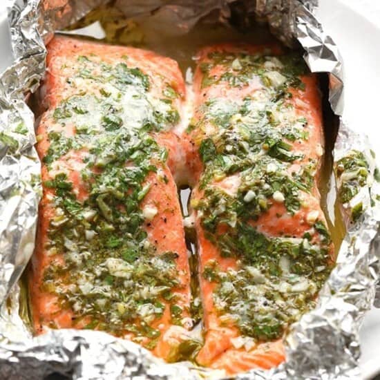 Grilled salmon in foil on a plate.