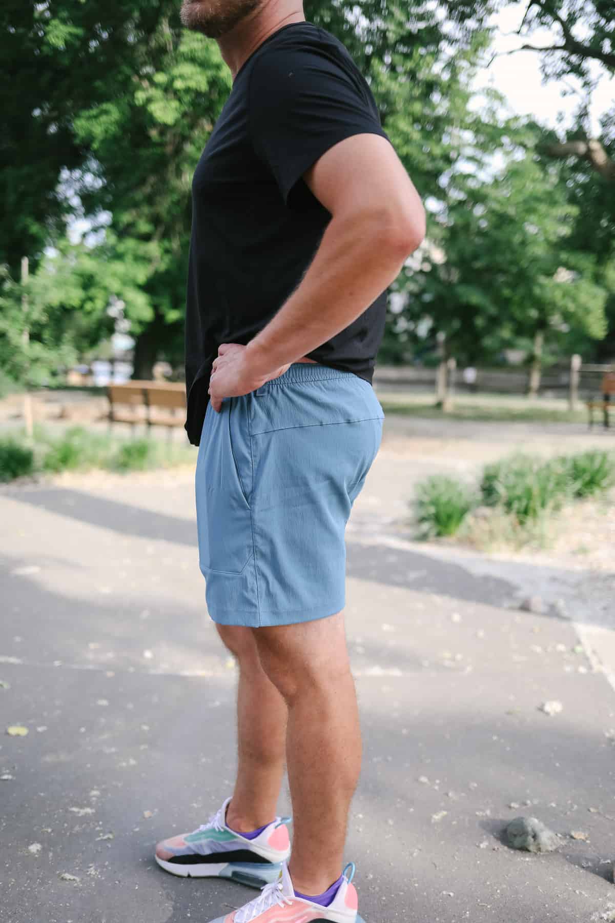 a man standing in a park.