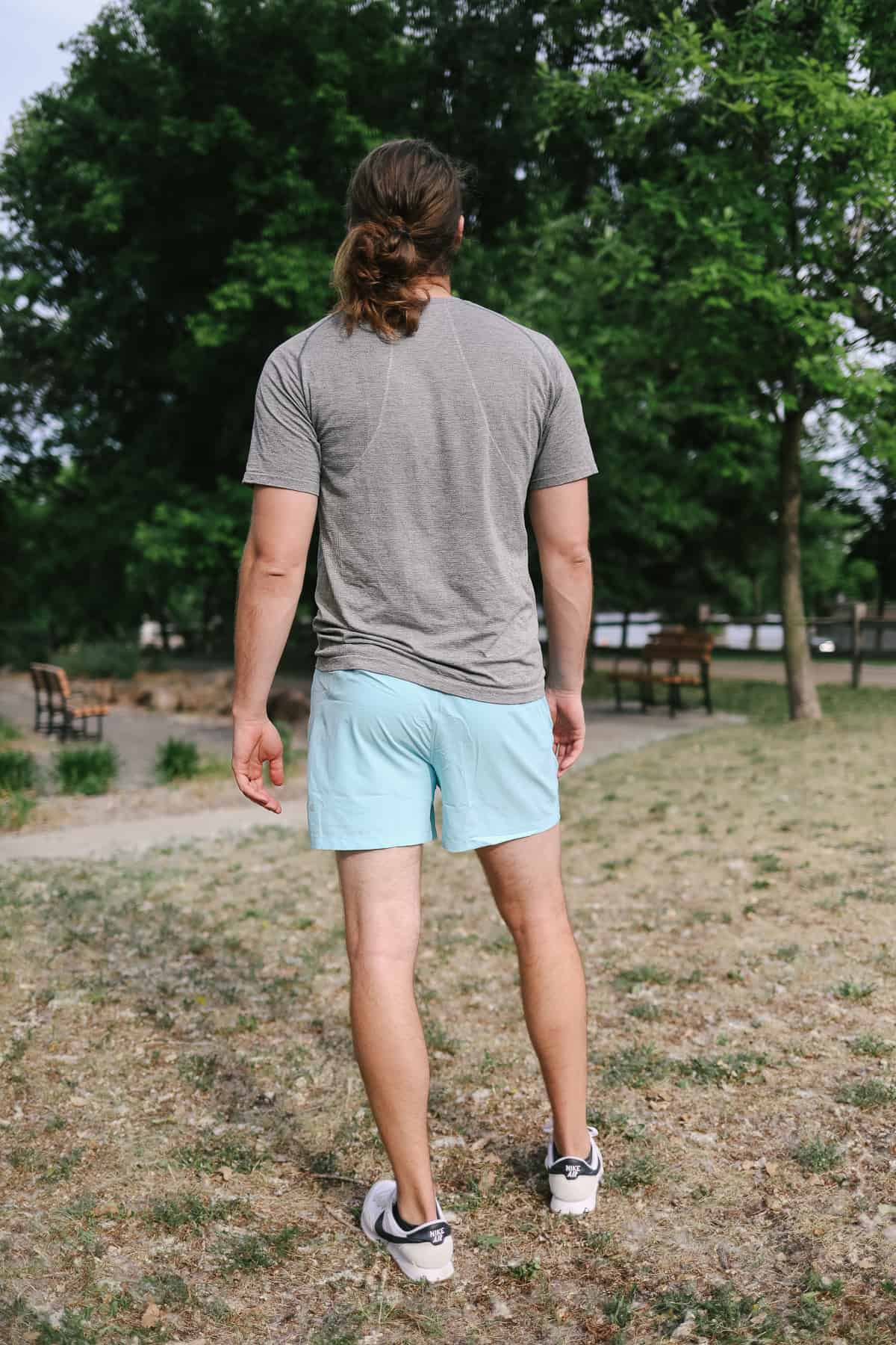 a man standing in a field.