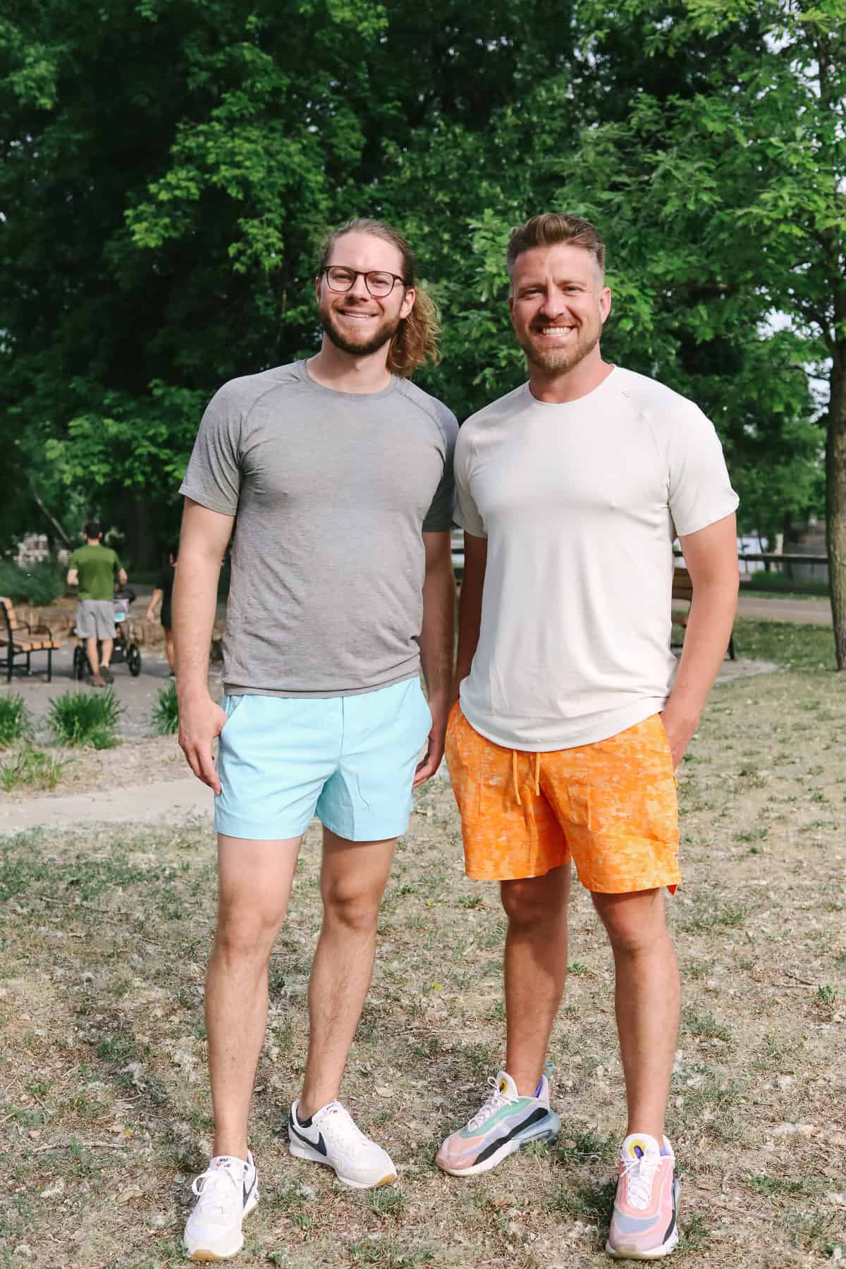 a couple of men standing next to each other.