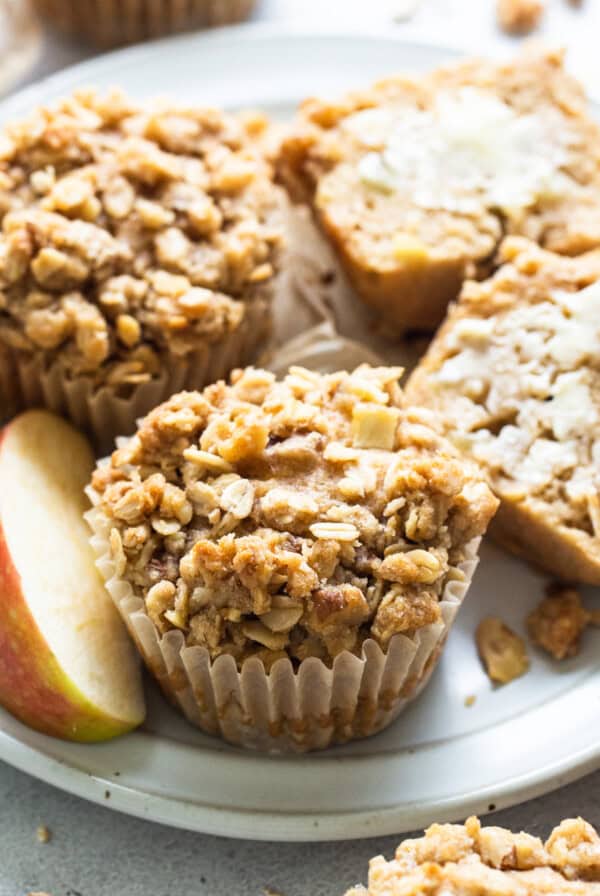 apple granola muffins on a white plate.